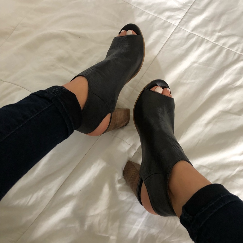 Leather peep toe booties.